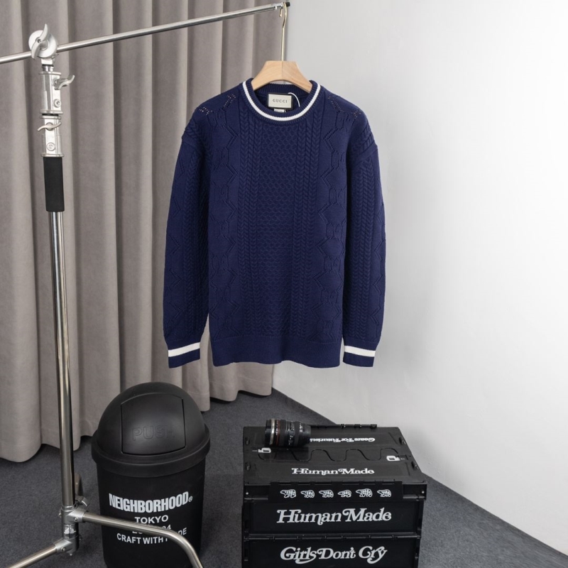 G*u*i sweaters